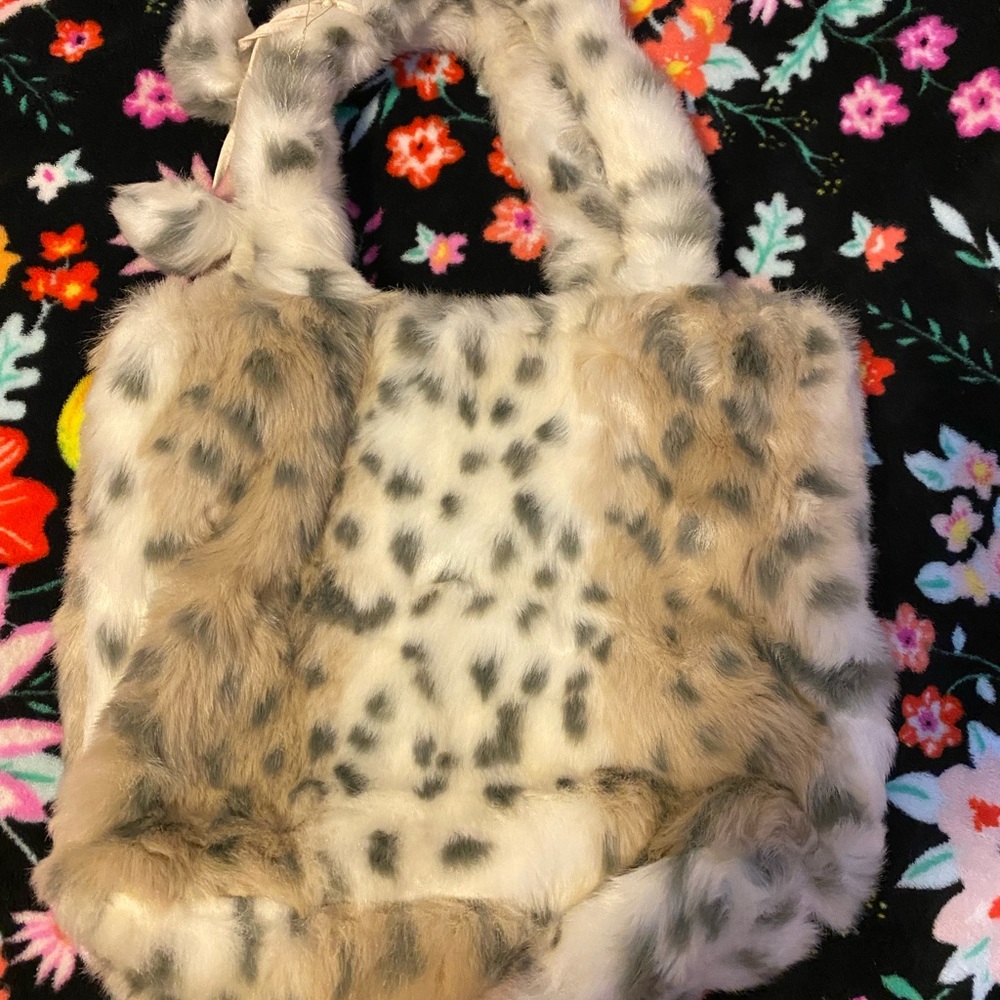 pottery barn teen faux snow leopard bag